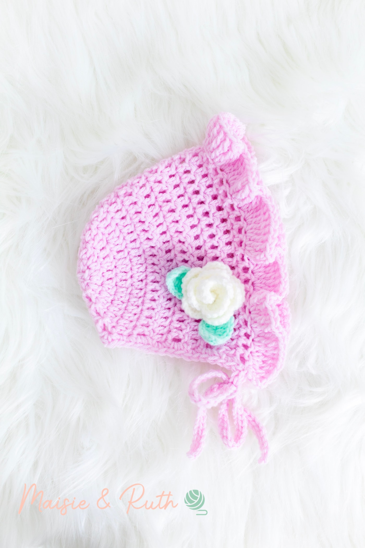 Crochet Baby Hat Pattern on Fluffy Rug