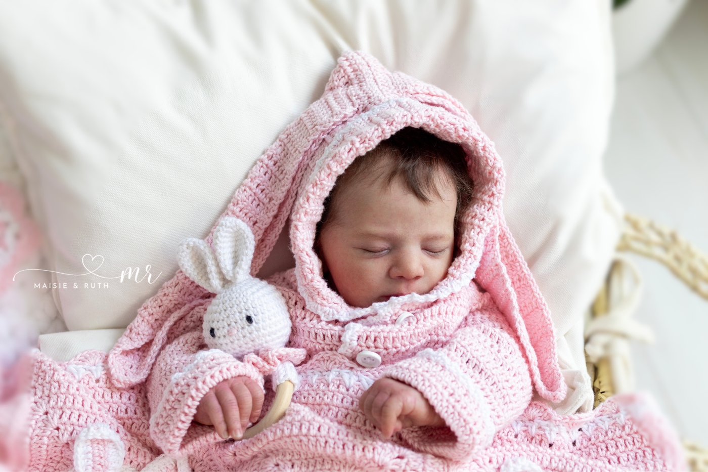 Bunny Crochet Baby Blanket over baby girl