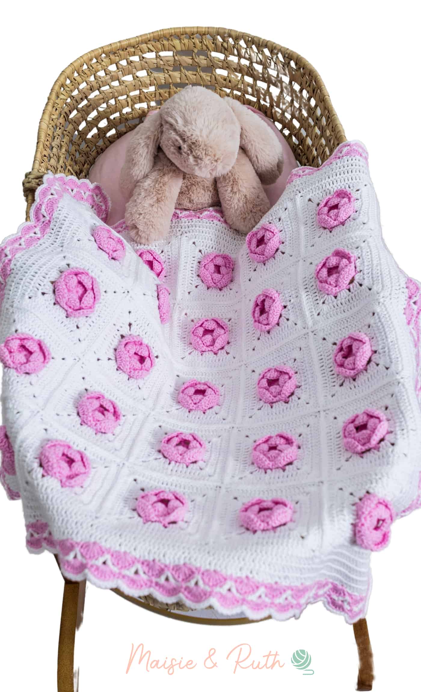 Crochet Rose Baby Blanket In Wicker cot with bunny