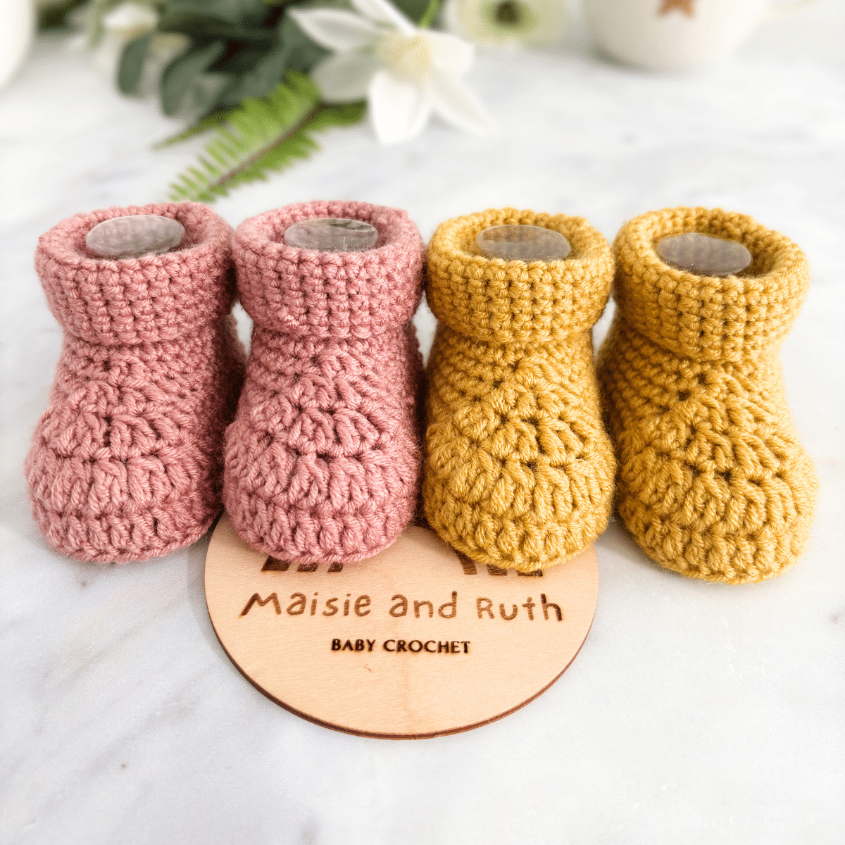 Close-up of fast crochet baby booties texture and stitches