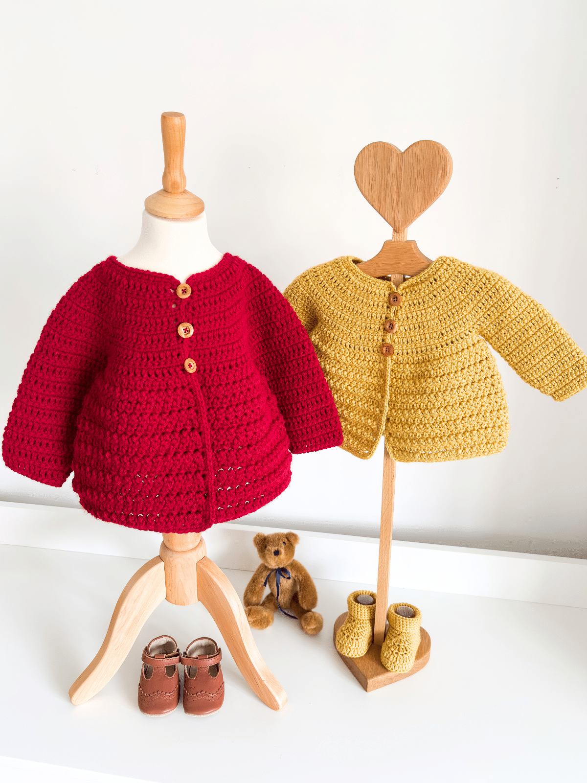 Easy crochet baby cardigan pattern made in red and yellow with video tutorial and printable PDF