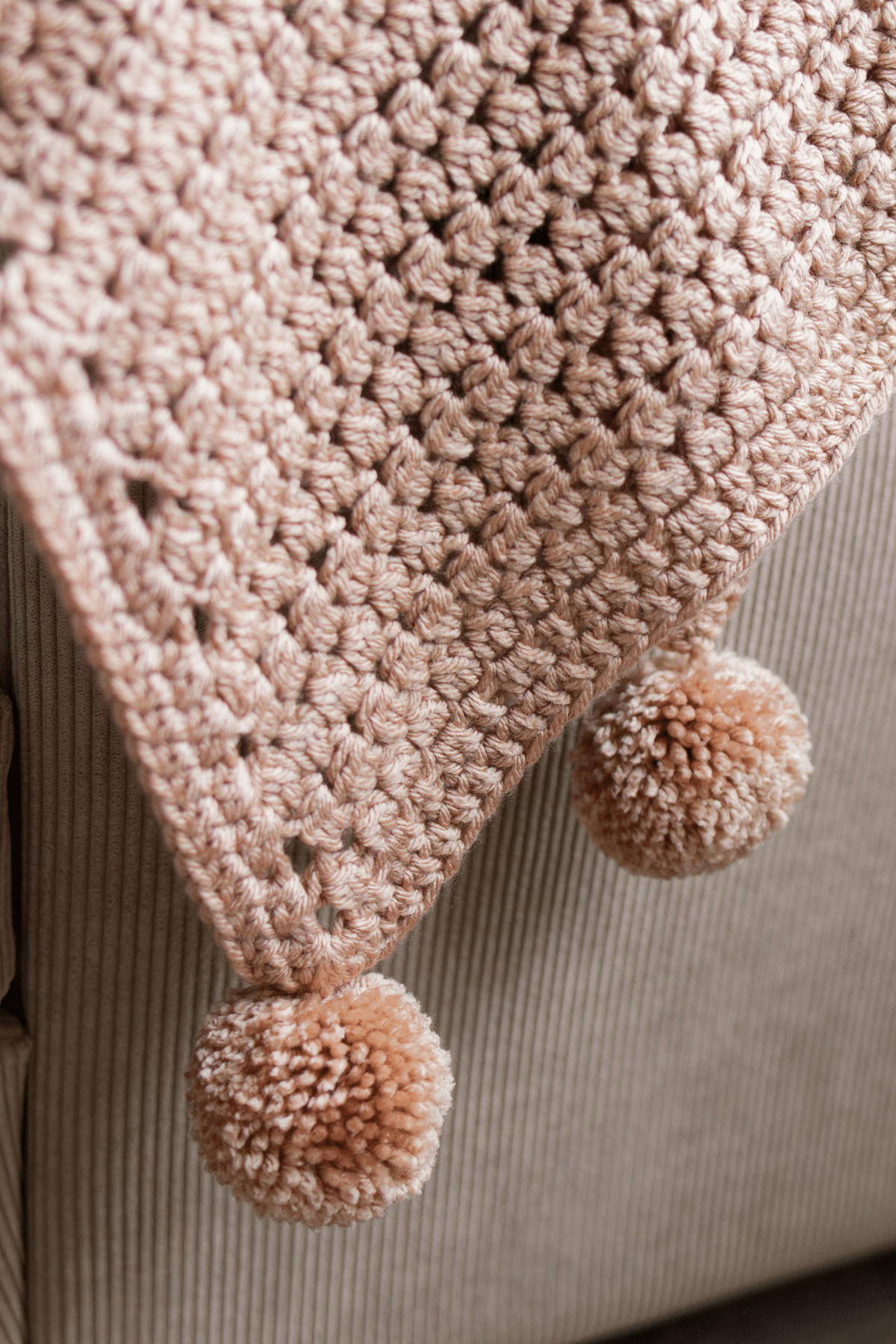 Handmade Willow Ridge Blanket draped over a chair