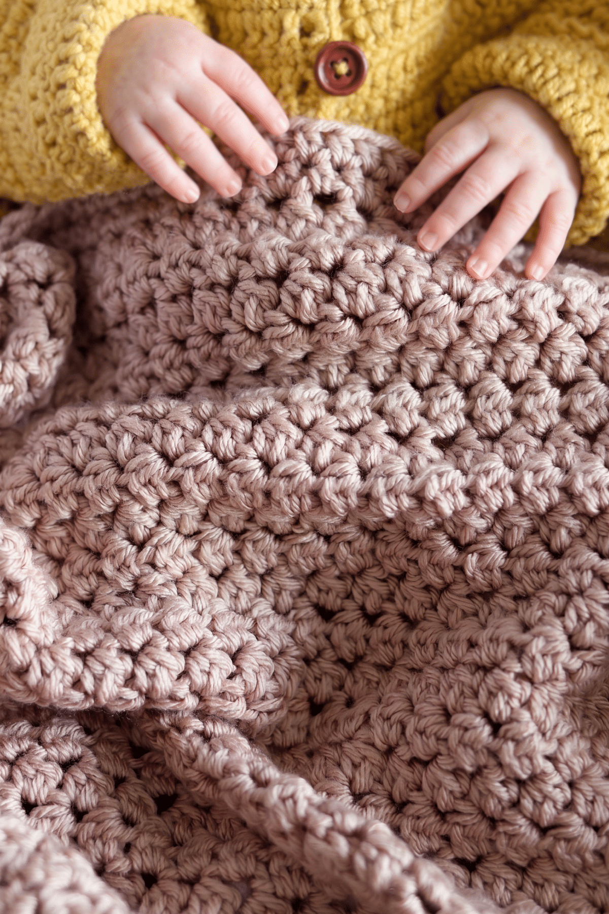 Close-up of the easy crochet baby blanket showing raised ridges