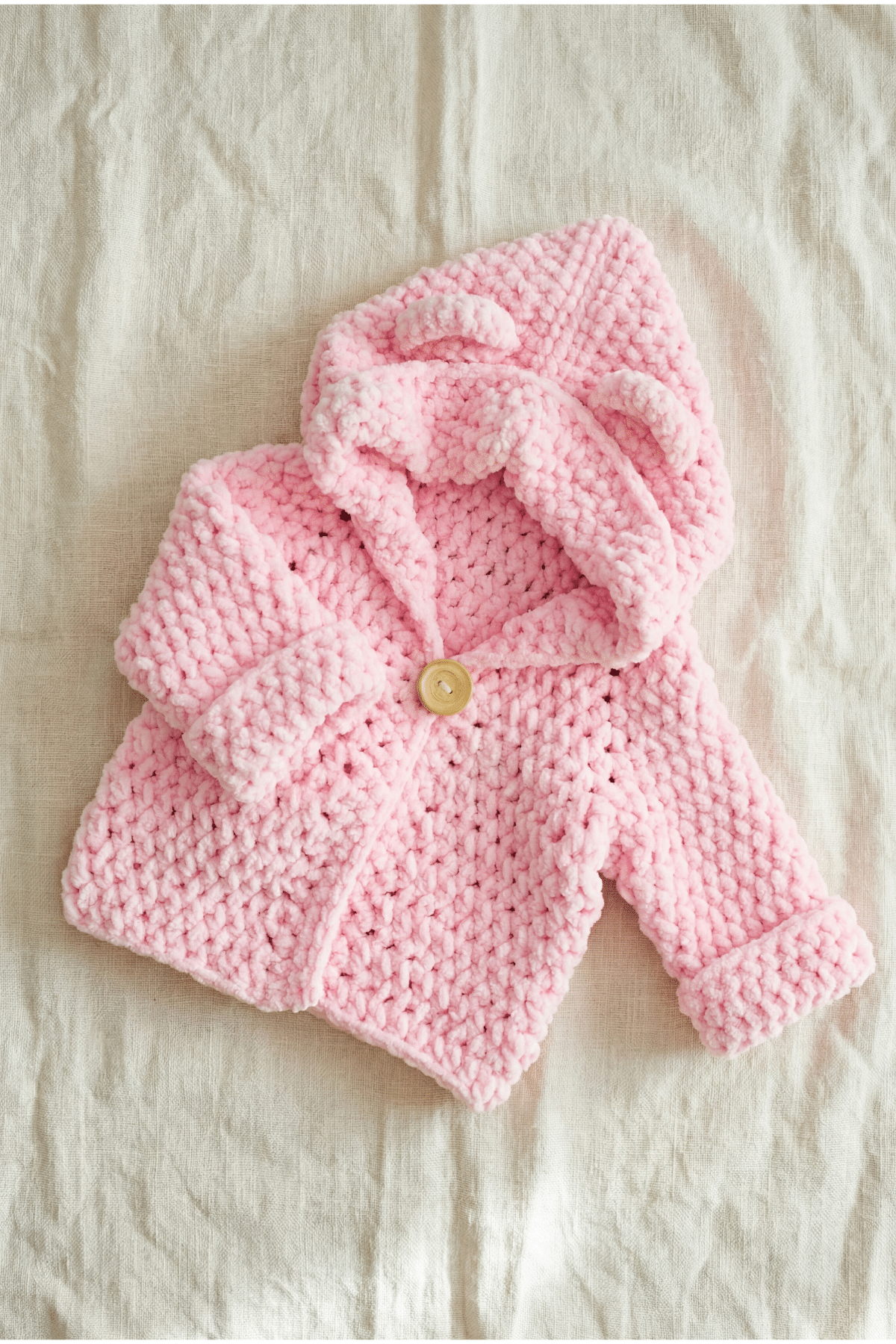 crochet baby hoodie made in pink chunky chenille yarn