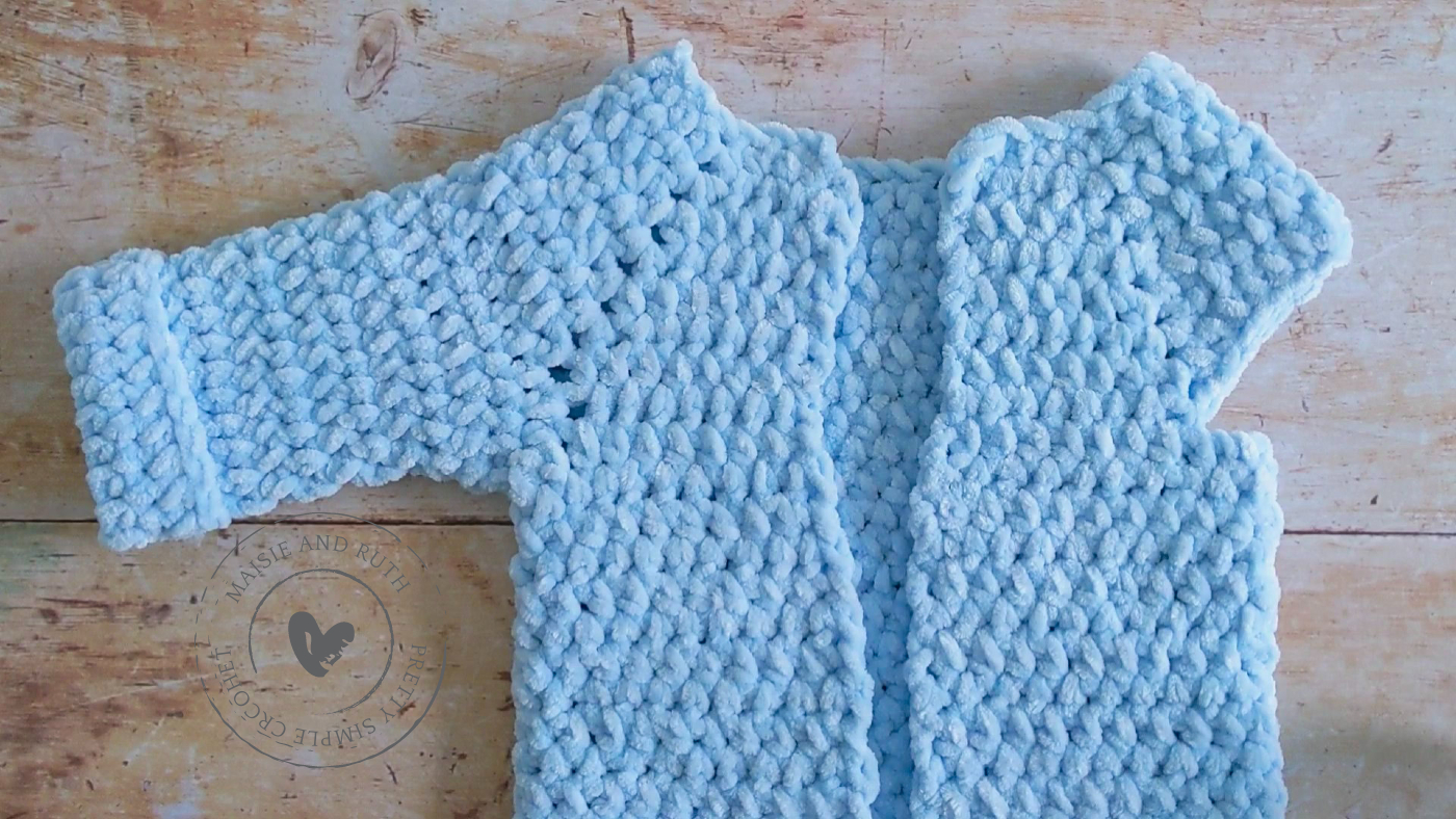 Right sleeve completed on crochet baby hoodie