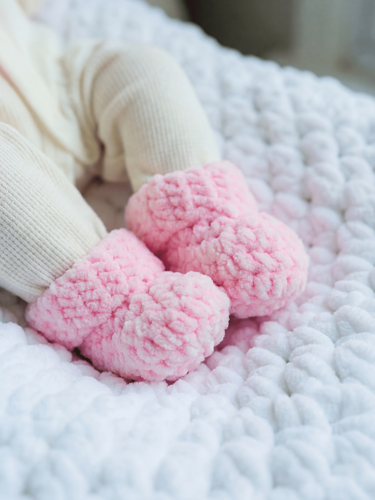 chunky crochet baby booties in soft pink chenille yarn