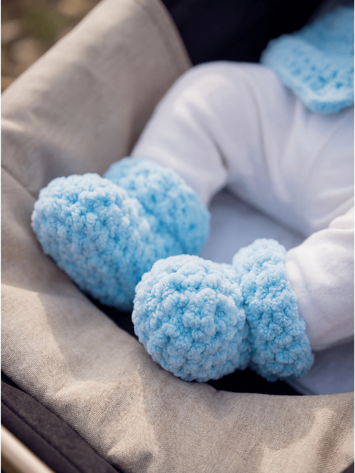 chunky crochet baby booties in plush blue chenille yarn beginner friendly pattern