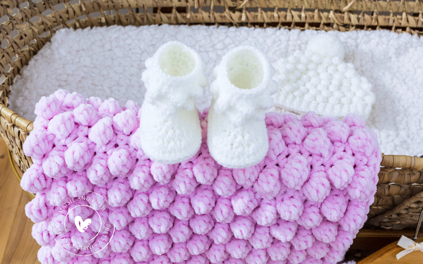 crochet bobble stitch blanket in pink closeup