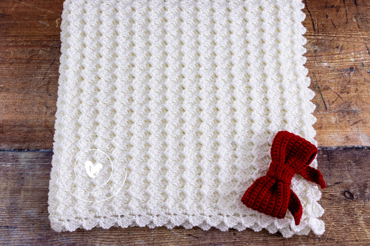 shell crochet baby blanket folded up