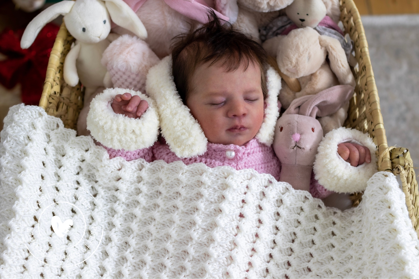 shell crochet baby blanket over baby