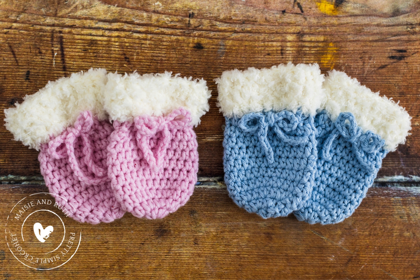 Warm Crochet Baby Mittens on wood table
