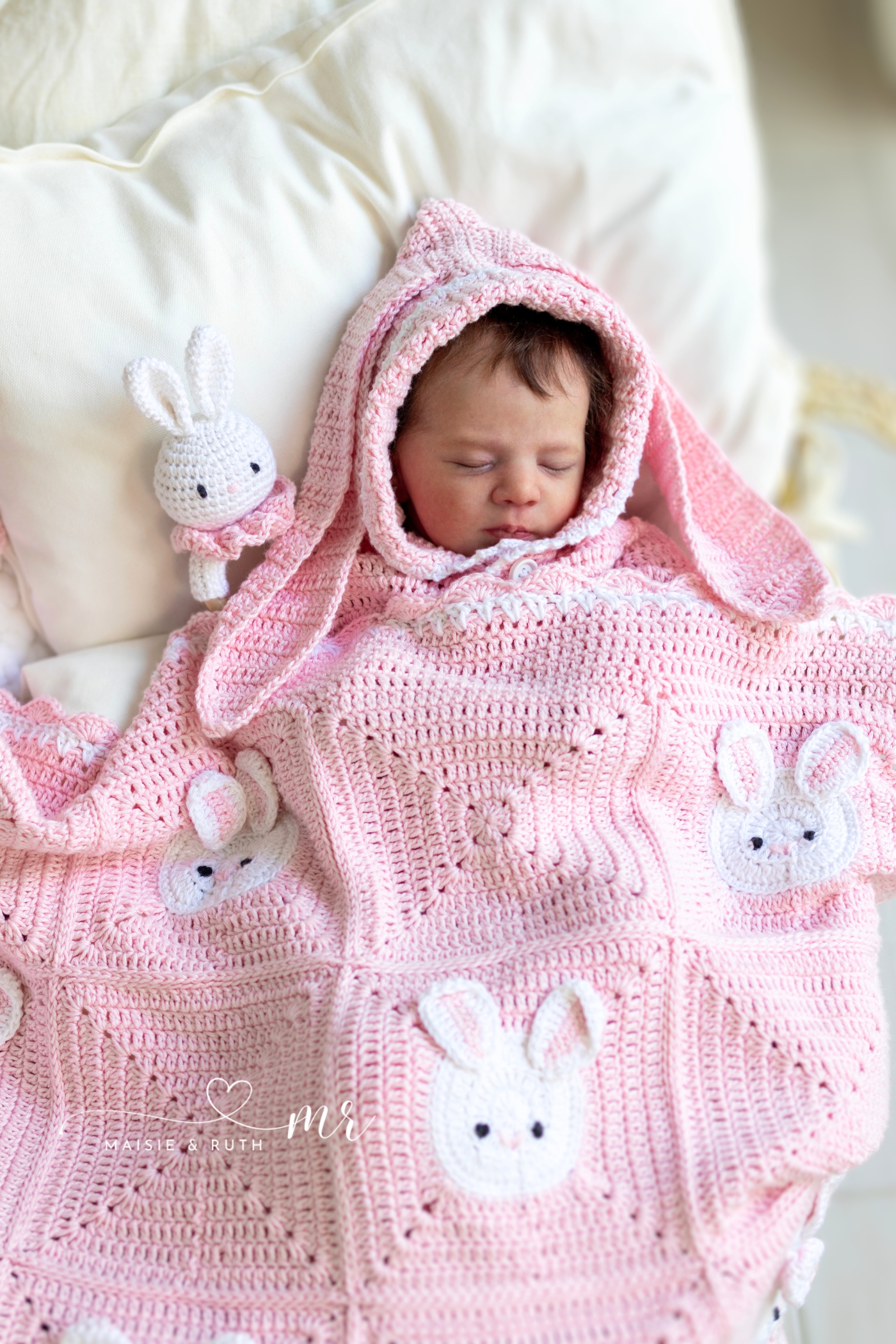 baby sleeping in crochet bunny baby hoodie