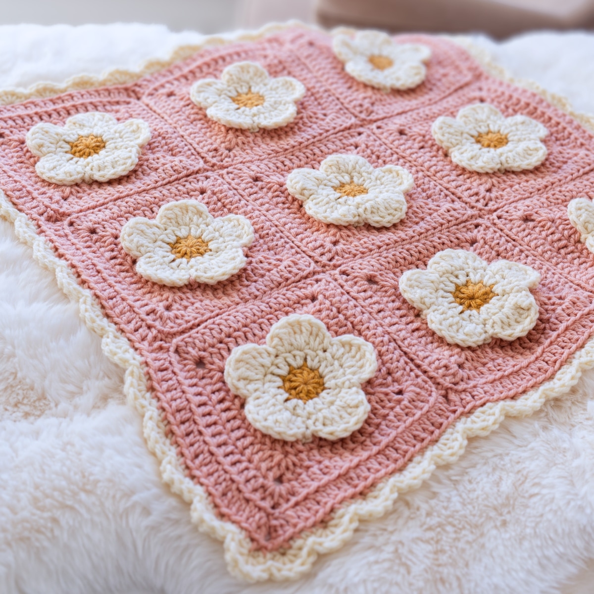 Bulky yarn baby cozy petals blanket laid flat showing 3x3 square layout